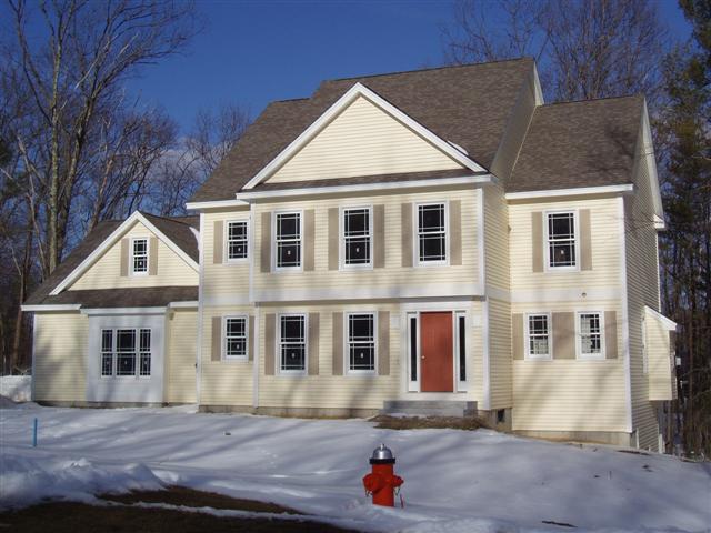 Open concept 4 bedroom with angled staircase