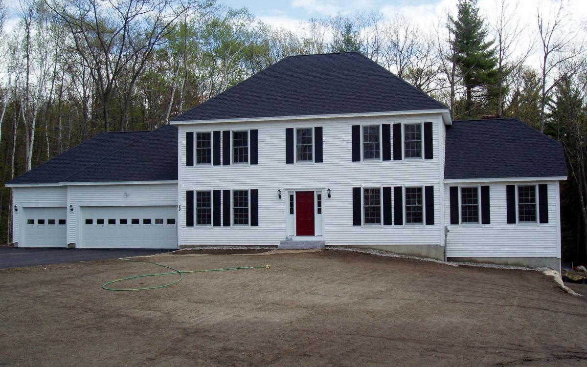 Four Bedroom Hip Roof Colonial with three Car Garage